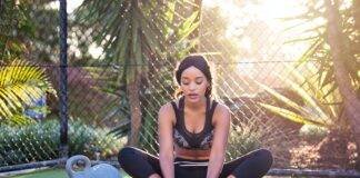 Women in a yoga pose and meditating