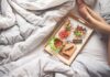 Healthy food laying on a bed